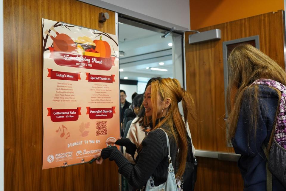 A photo of the ASI Food Pantry's second annual Friendsgiving Feast, for Sacramento State students in need of a hot holiday meal. Over 240 students enjoyed a hot buffet meal of quinoa salad, honey glazed carrots, herb stuffing, creamy mashed potatoes, mac and cheese, slow-roasted turkey, and garlic scallion gravy to celebrate the Thanksgiving season. Renaissance Society members came out to volunteer as a greeters and KSSU emceed & hosted human bingo with prizes.